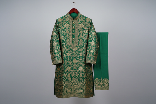 traditional male indian suit on a hanger 